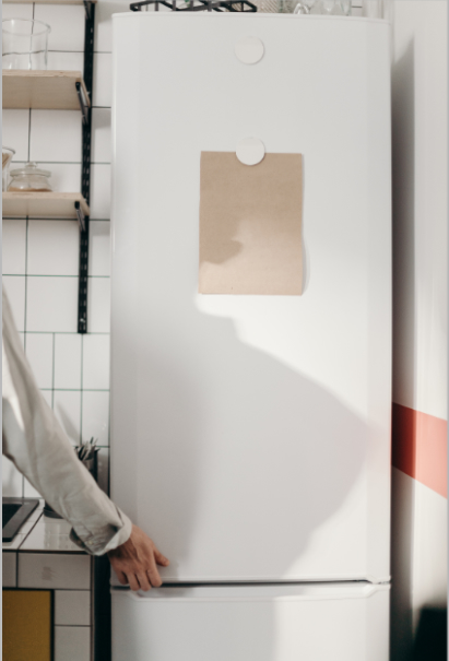 Person opening a fridge